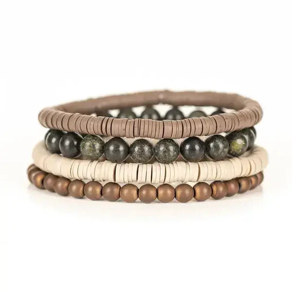 Layered men’s bracelet set featuring taupe and ivory heishi beads, natural green stone beads, and matte bronze beads on elastic strands, displayed on a white background.