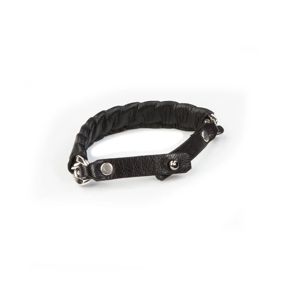 Men's black leather wrap bracelet featuring a padded stitched band, adjustable leather strap, and silver-tone hardware for a rugged modern look.