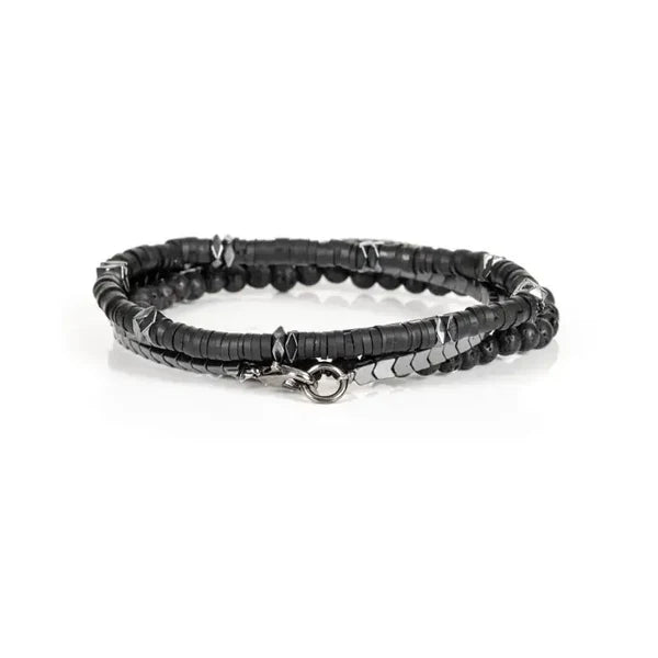Black beaded bracelet on a white background