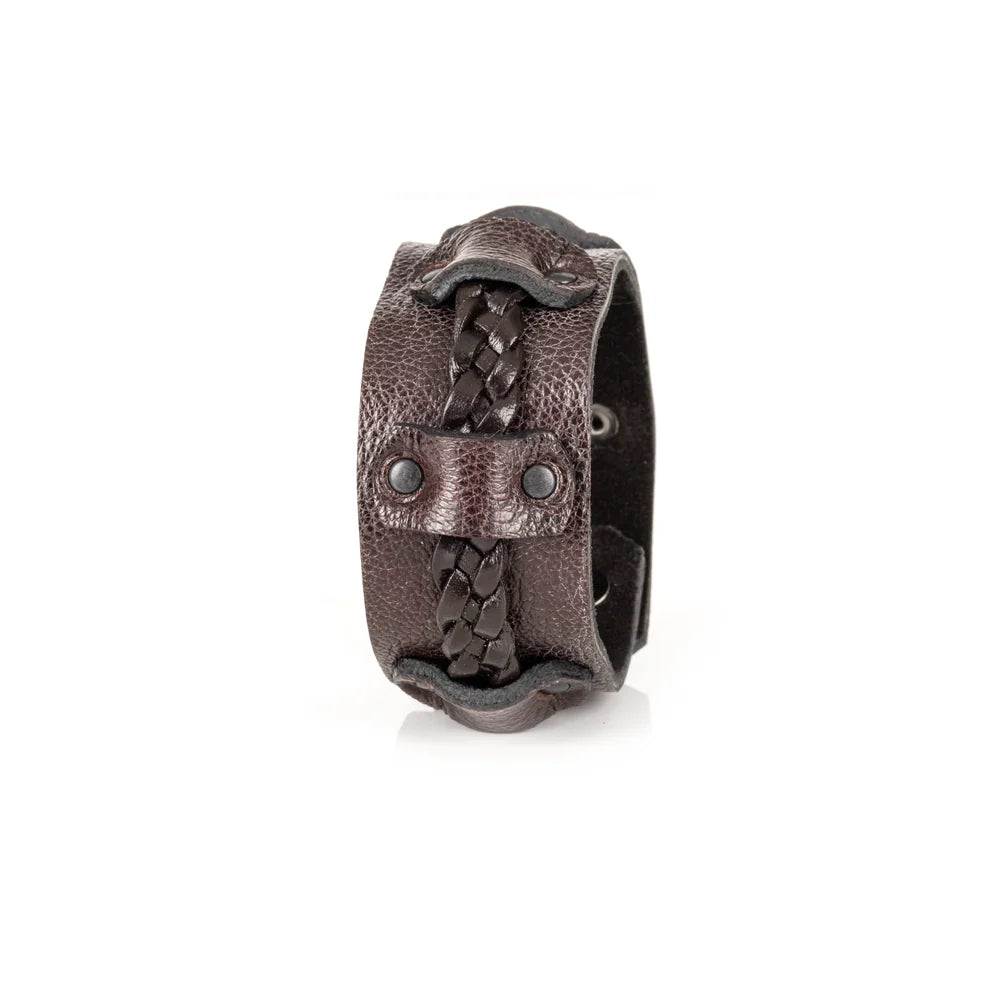 Men's handcrafted genuine leather cuff bracelet in dark brown featuring a wide leather band with a braided leather center strap, matte black rivet accents, and premium artisan craftsmanship. Luxury men's leather wristband photographed on a clean white background.