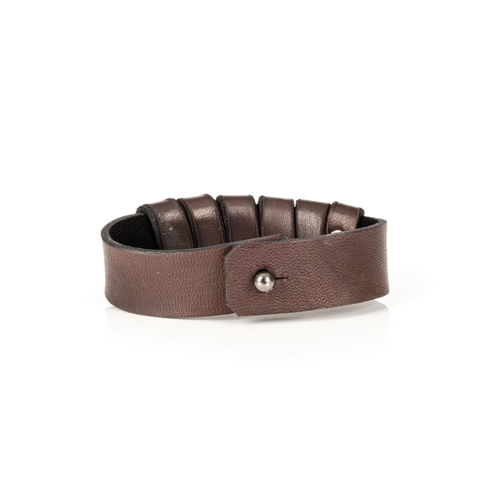 Men's handcrafted genuine leather cuff bracelet in dark brown featuring layered horizontal leather bands with a rugged stacked design and premium artisan craftsmanship. Luxury men's leather wristband photographed on a clean white background.