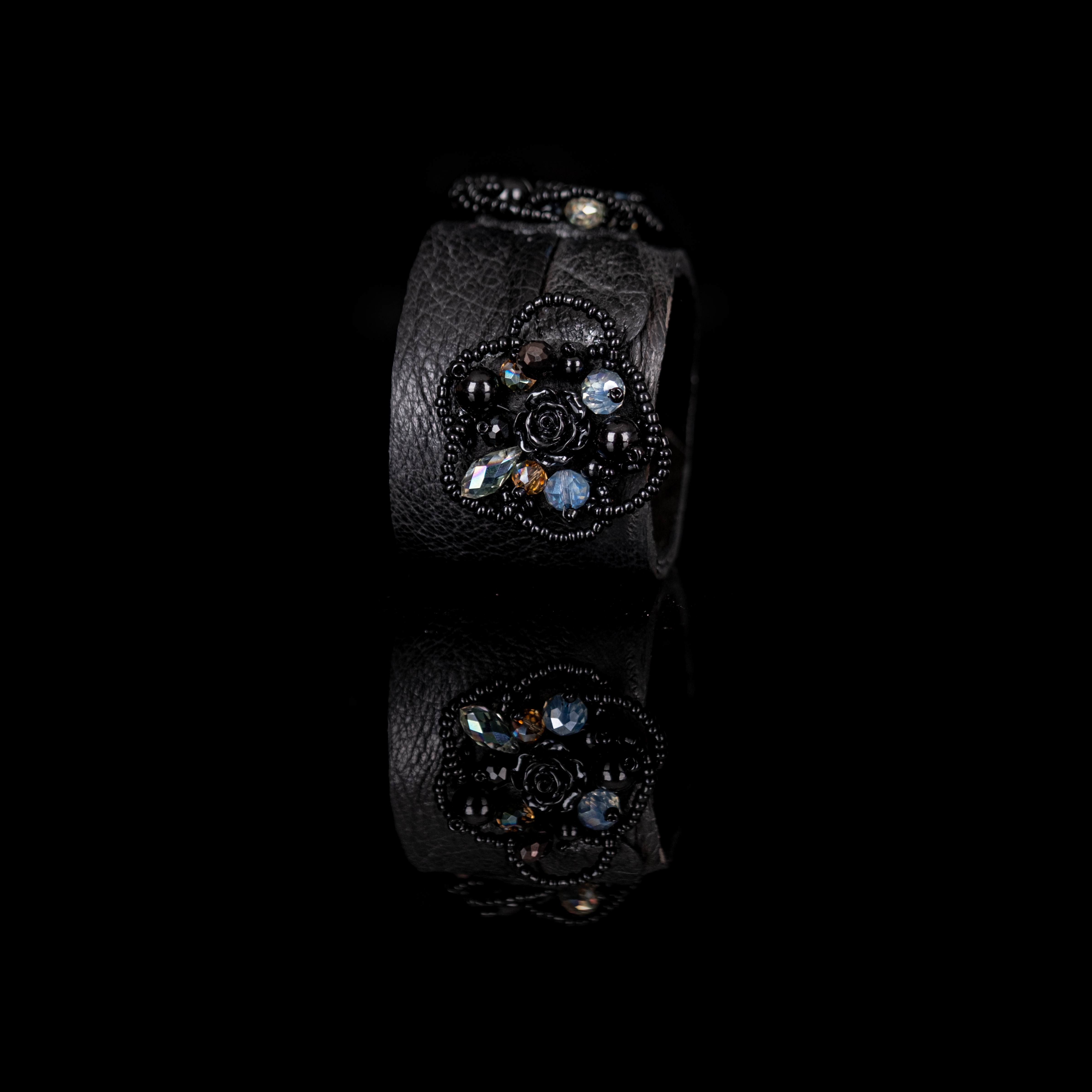Black leather cuff bracelet with black floral bead embroidery and crystal accents, handmade statement bracelet by THE DARK