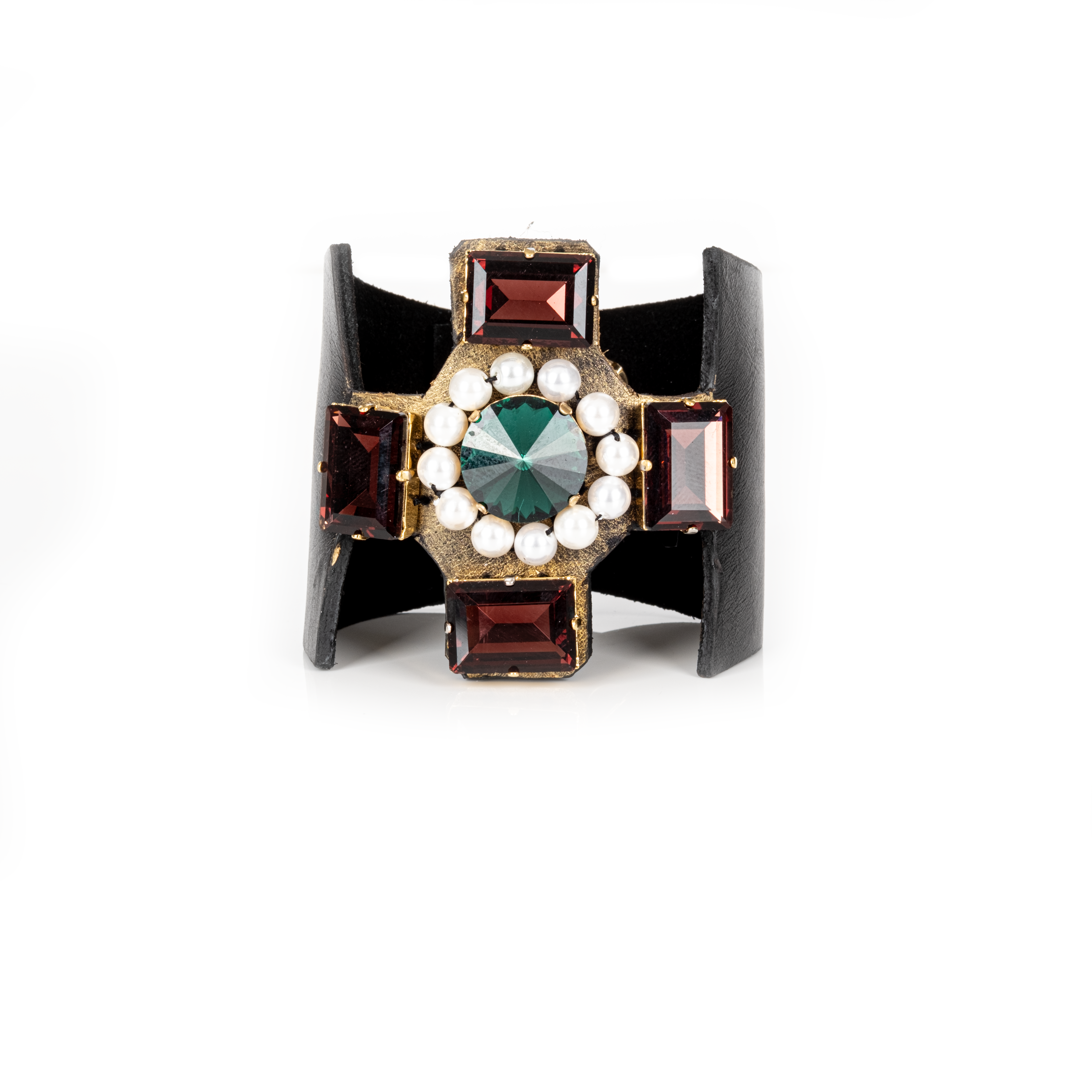 Black leather cuff with emerald green center stone, red crystals, and pearl detailing, statement bracelet