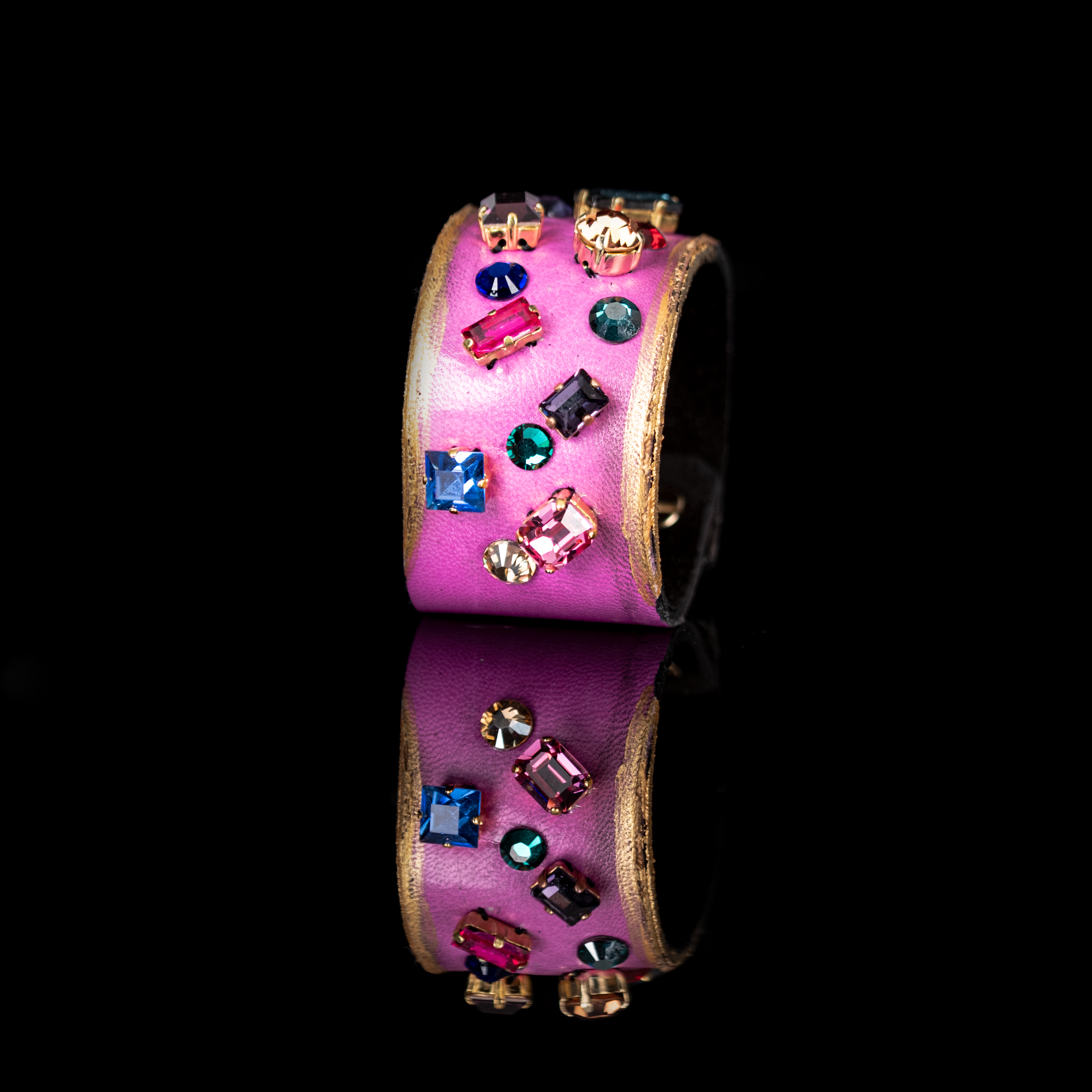 Pink leather cuff bracelet with multicolor crystals and gold edges, wide statement bracelet with colorful gemstone accents for women