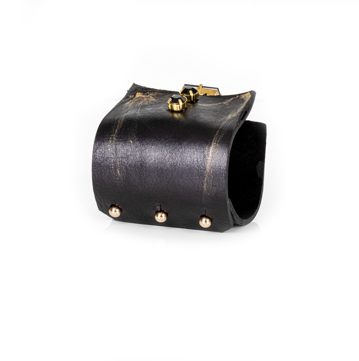 Black leather cuff bracelet with gold brushstroke accents and black crystals, handmade statement bracelet by THE DARK