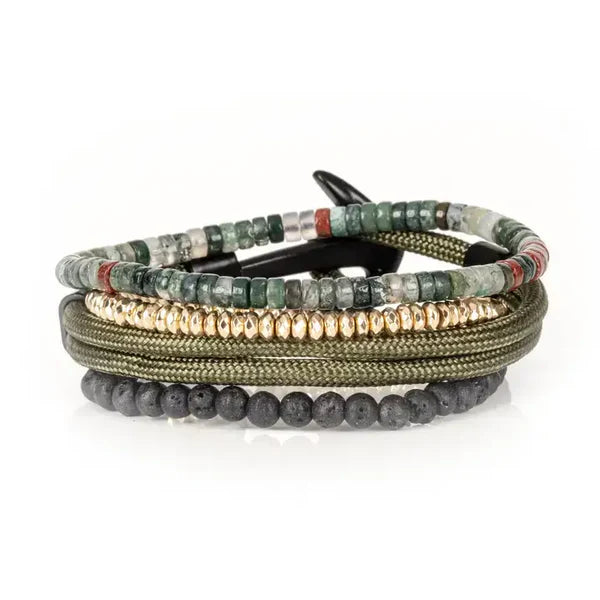 Layered men’s bracelet set featuring green cord with a black anchor clasp, lava stone beads, gold-tone crystal beads, and natural stone heishi beads in earthy green and gray tones, displayed on a white background.