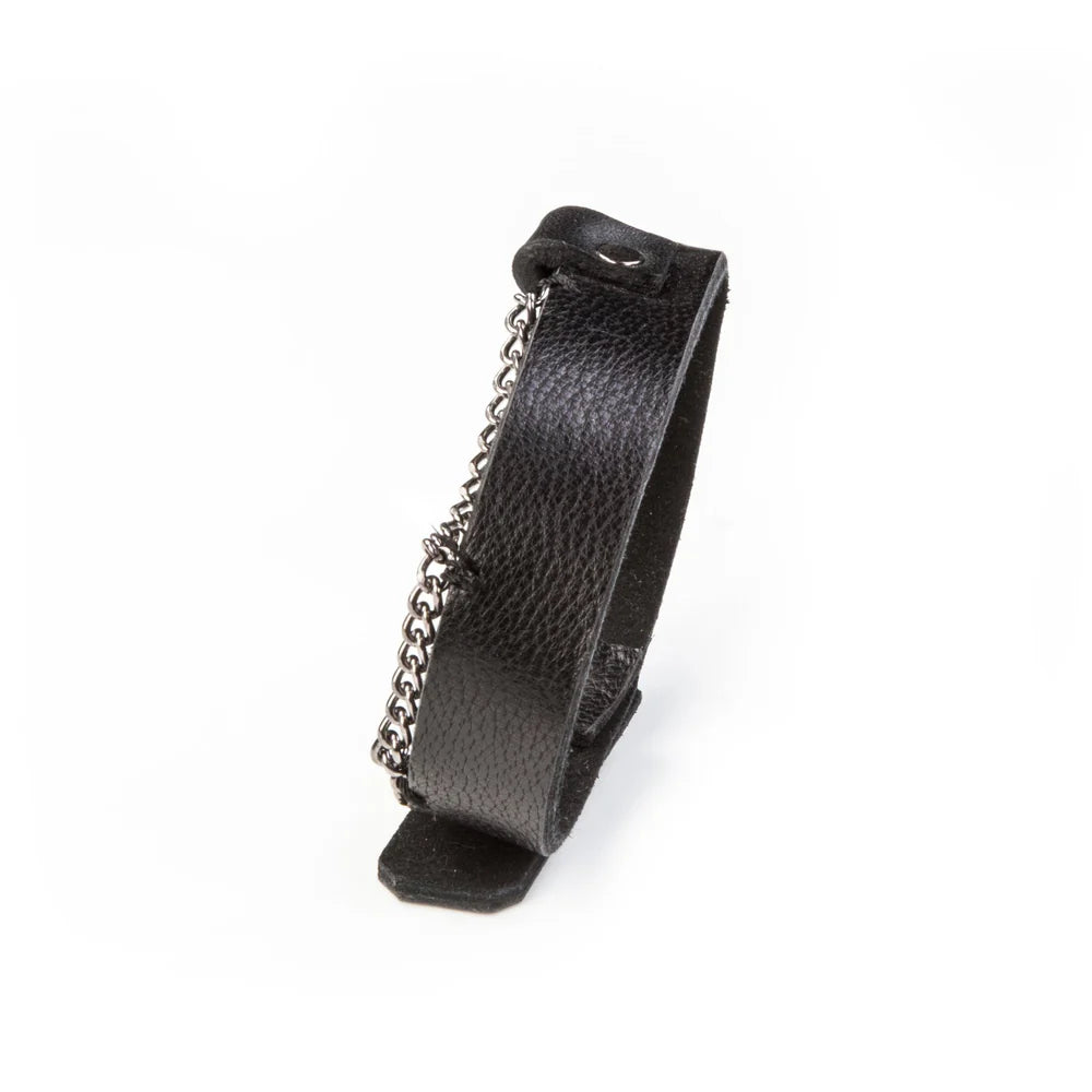 Men's black genuine leather cuff bracelet featuring a minimalist wide-band design with a gunmetal chain accent and snap-button closure, combining rugged style with modern sophistication.