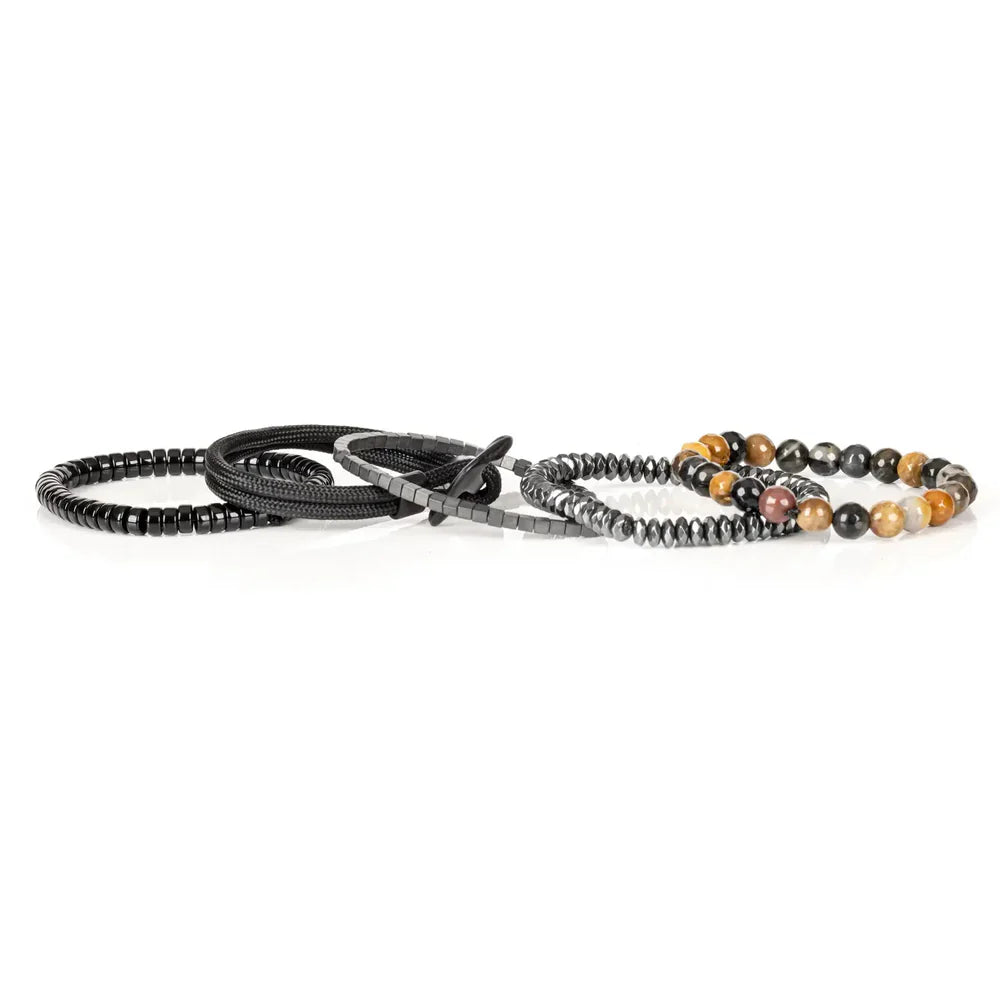 Layered men’s bracelet set featuring multicolor natural stone beads, faceted hematite beads, black hematite cube beads, braided black cord wraps, and glossy black disc beads, displayed on a white background.