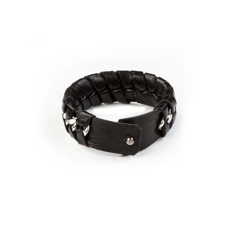 Men's black braided leather bracelet featuring an interwoven silver-tone chain accent, wide cuff design, and magnetic clasp closure for a bold contemporary luxury look.