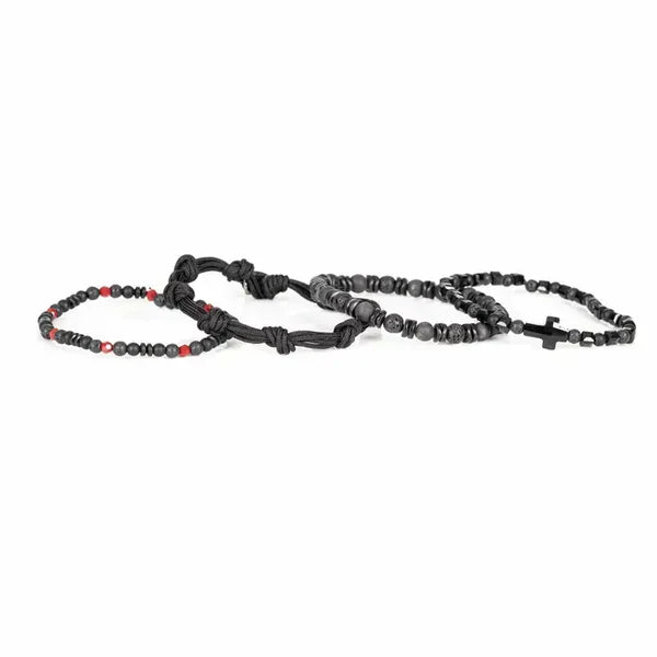 Layered men’s bracelet set featuring black lava stone beads, faceted black crystal beads, matte gray stone beads, braided black cord wraps, red accent beads, and a black arrow-shaped centerpiece, displayed on a white background.