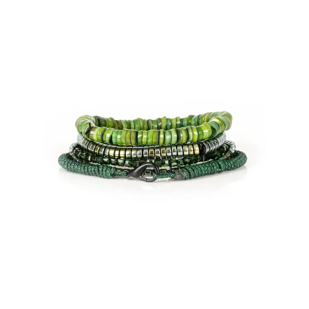 Layered men’s bracelet set featuring green shell heishi beads, metallic hematite beads, faceted dark green crystal beads, and a braided green cord bracelet, displayed on a white background.