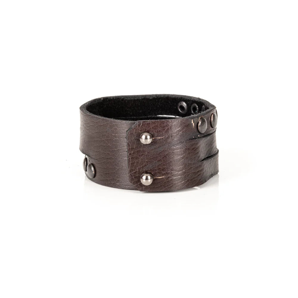 Black genuine leather wrap bracelet featuring layered leather bands with black rivet detailing and a handcrafted rugged design, displayed on a white background.