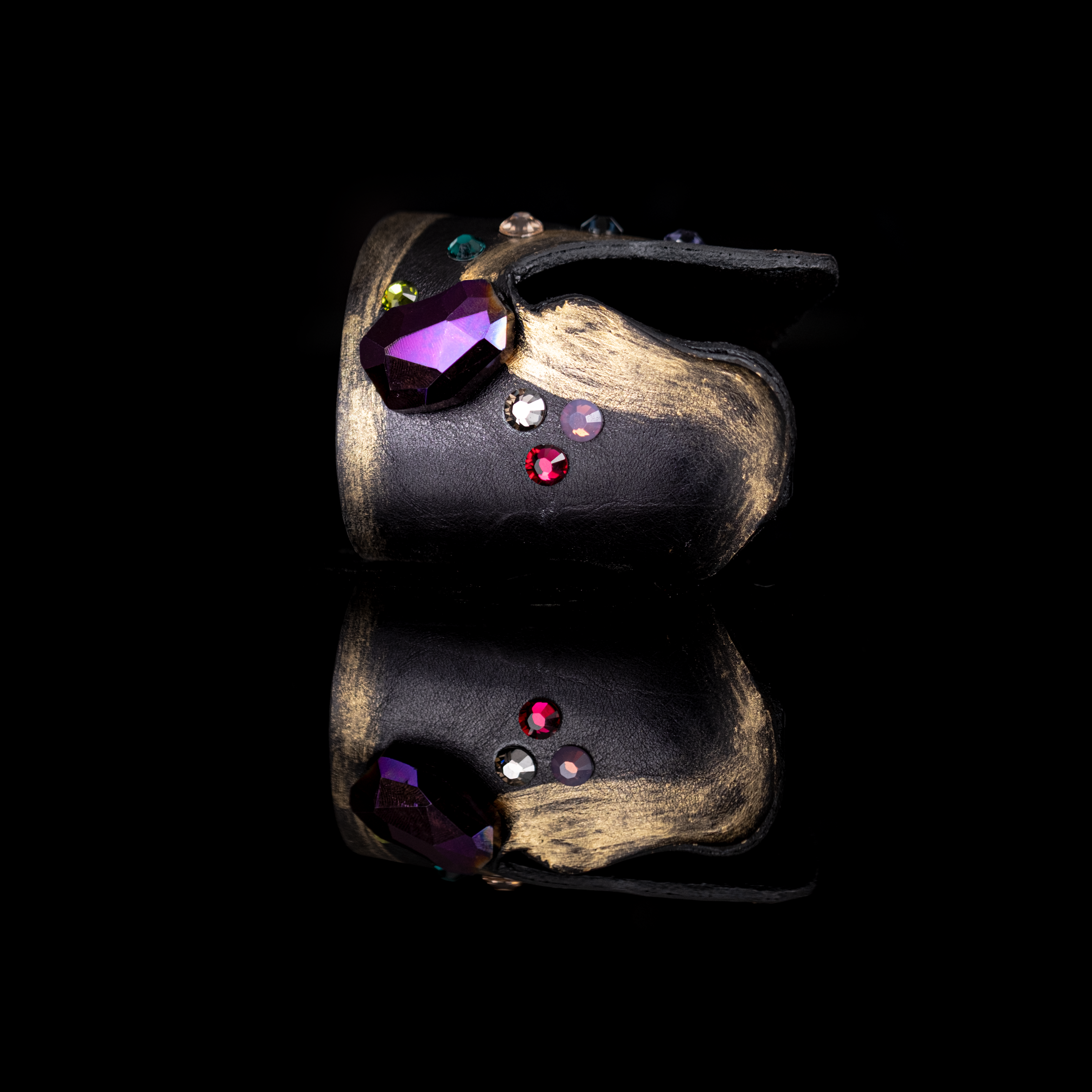 Black leather cuff bracelet with purple prism crystal and multicolor stone accents, handmade statement bracelet by THE DARK