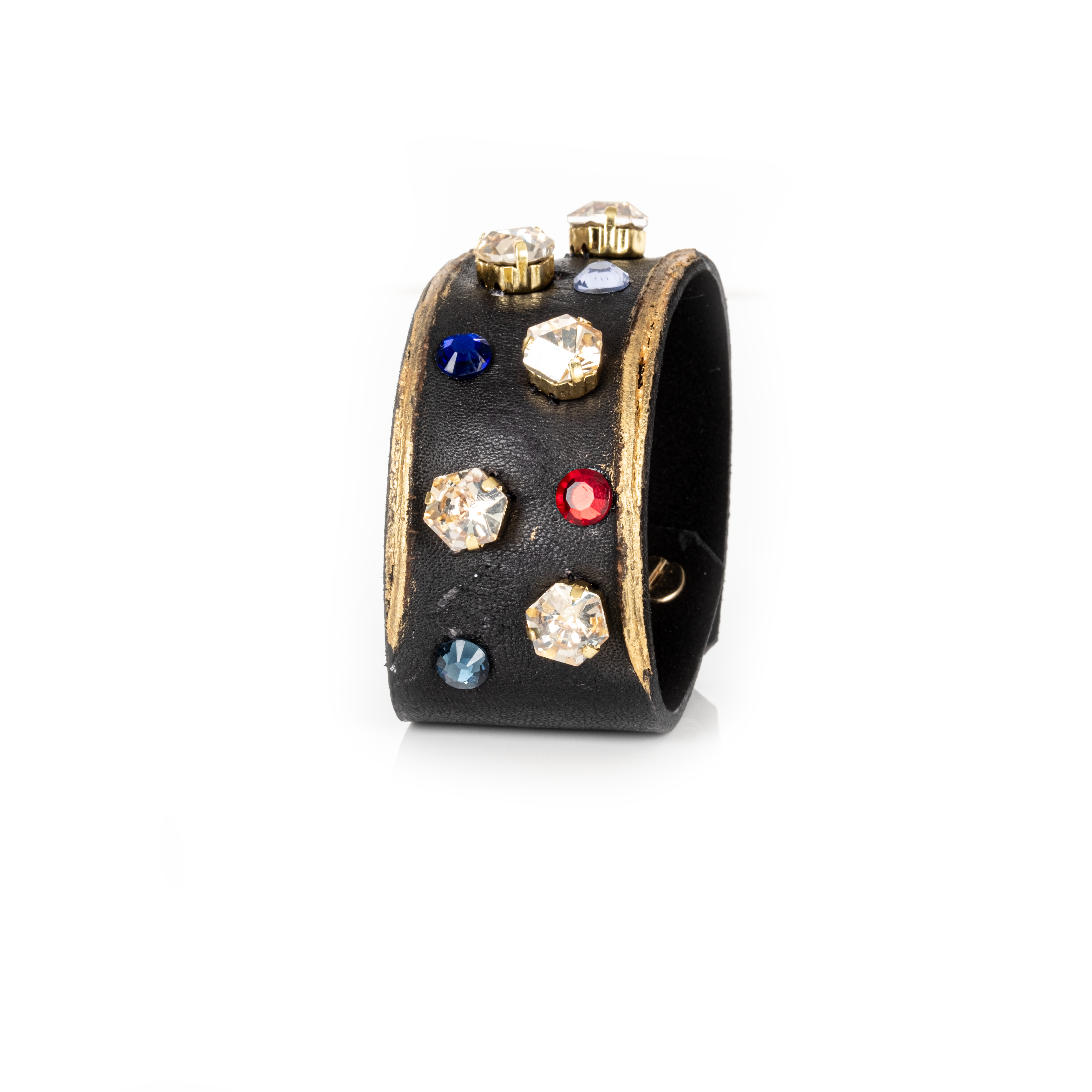 Black leather cuff with gold edges and scattered multicolor crystals, minimalist statement bracelet