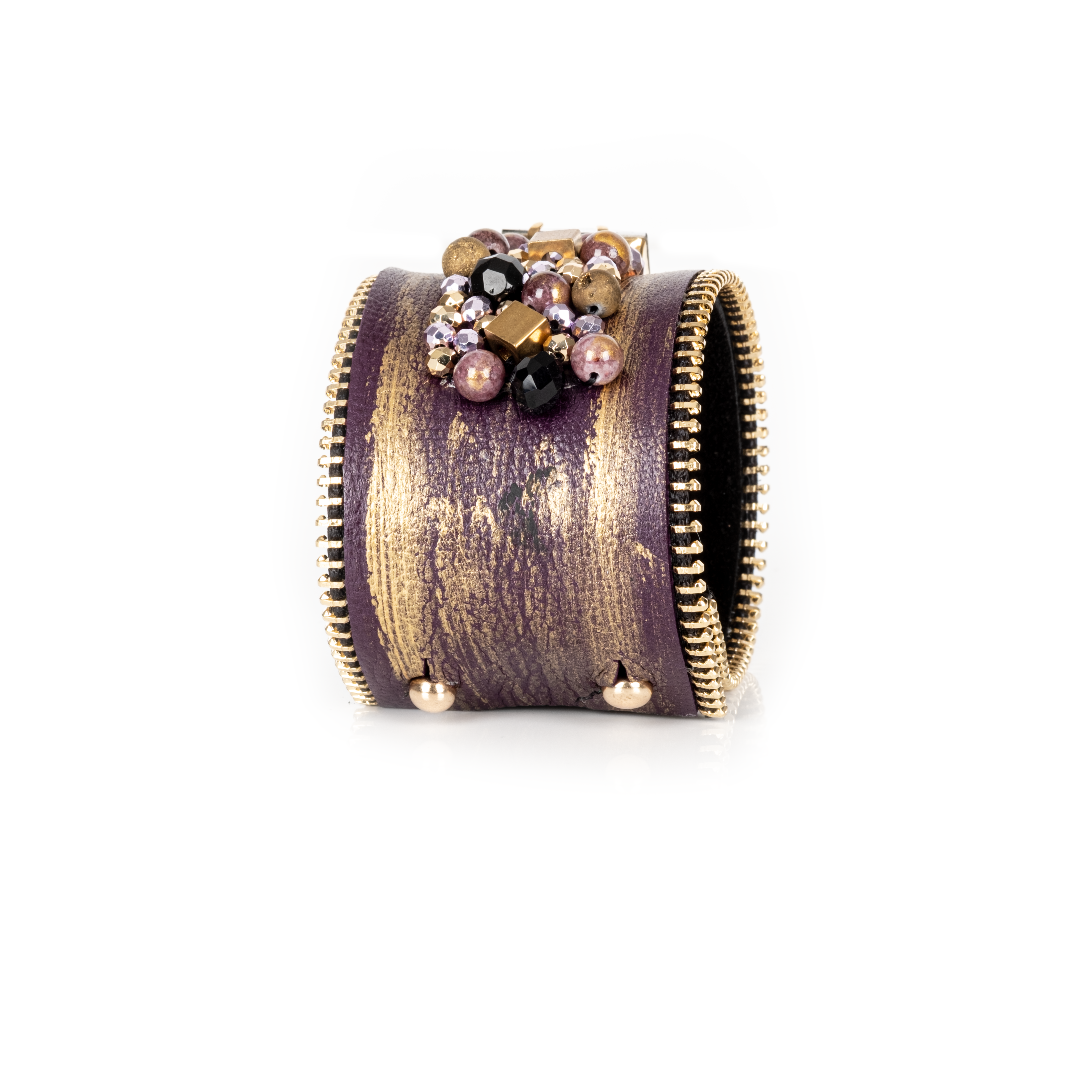 Gold brushed leather cuff with zipper edges and central crystal cluster embellishment, statement bracelet