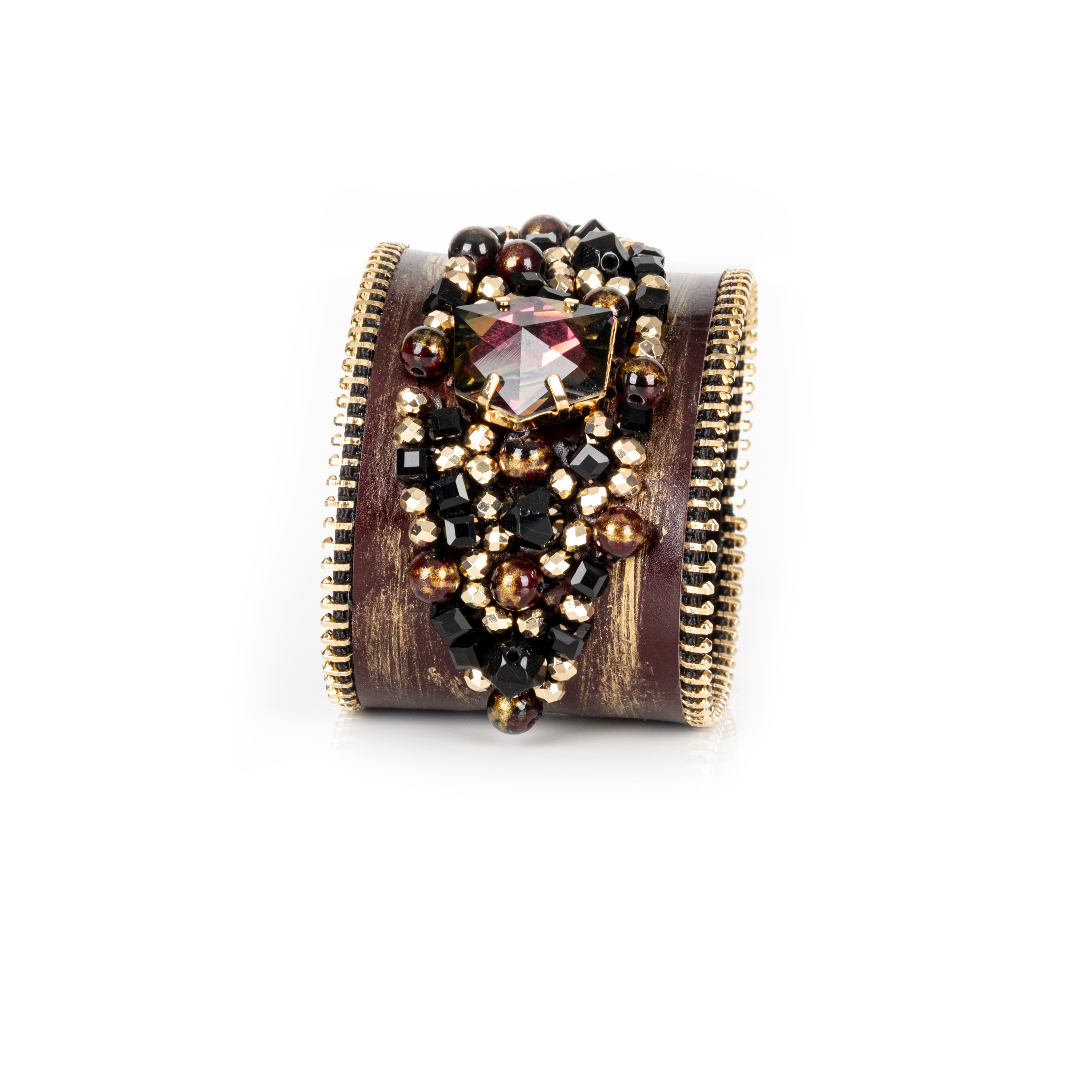 Dark leather cuff with gold brushed finish, zipper edges and black-gold crystal cluster centerpiece