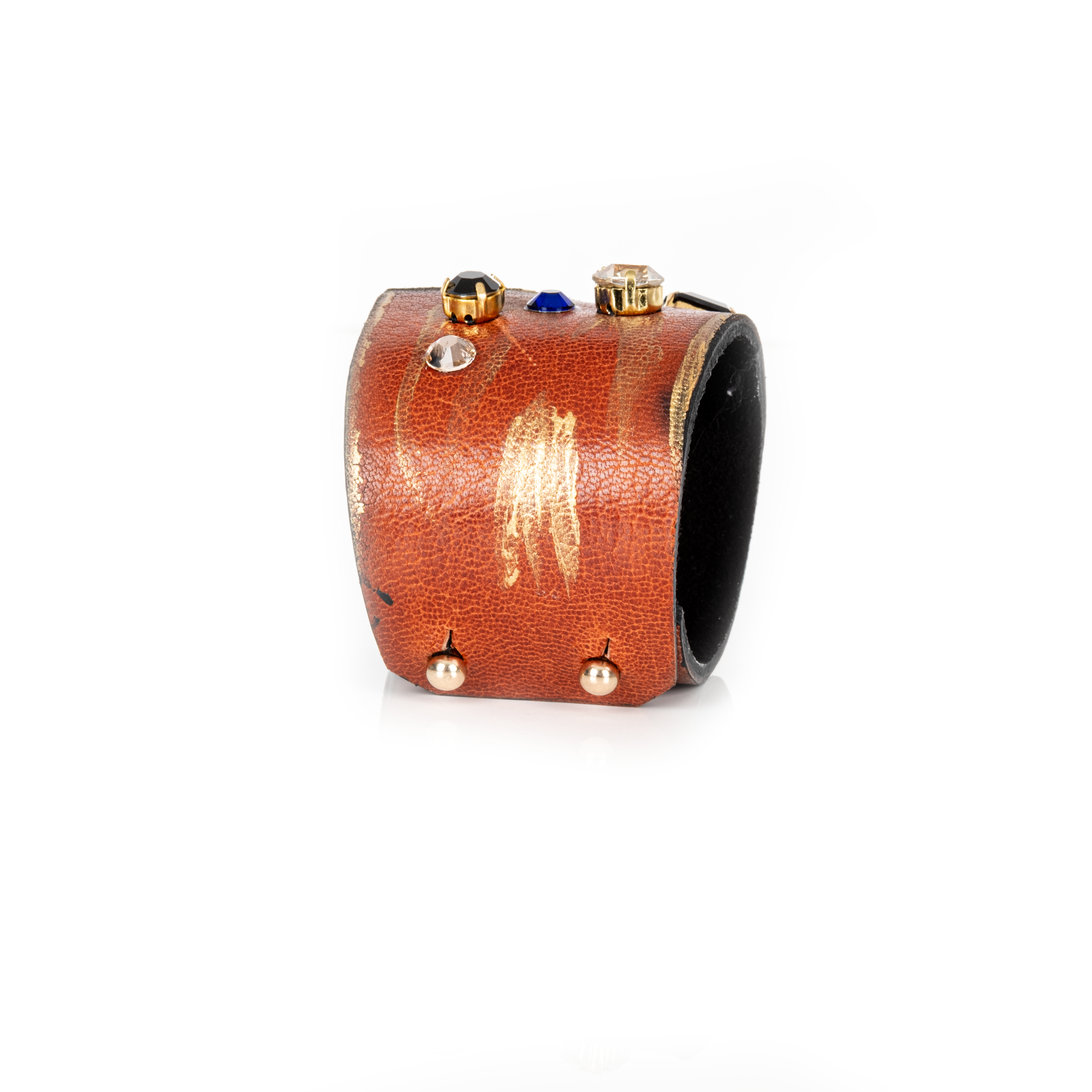 Copper-toned leather cuff bracelet with multicolor crystals and gold detailing