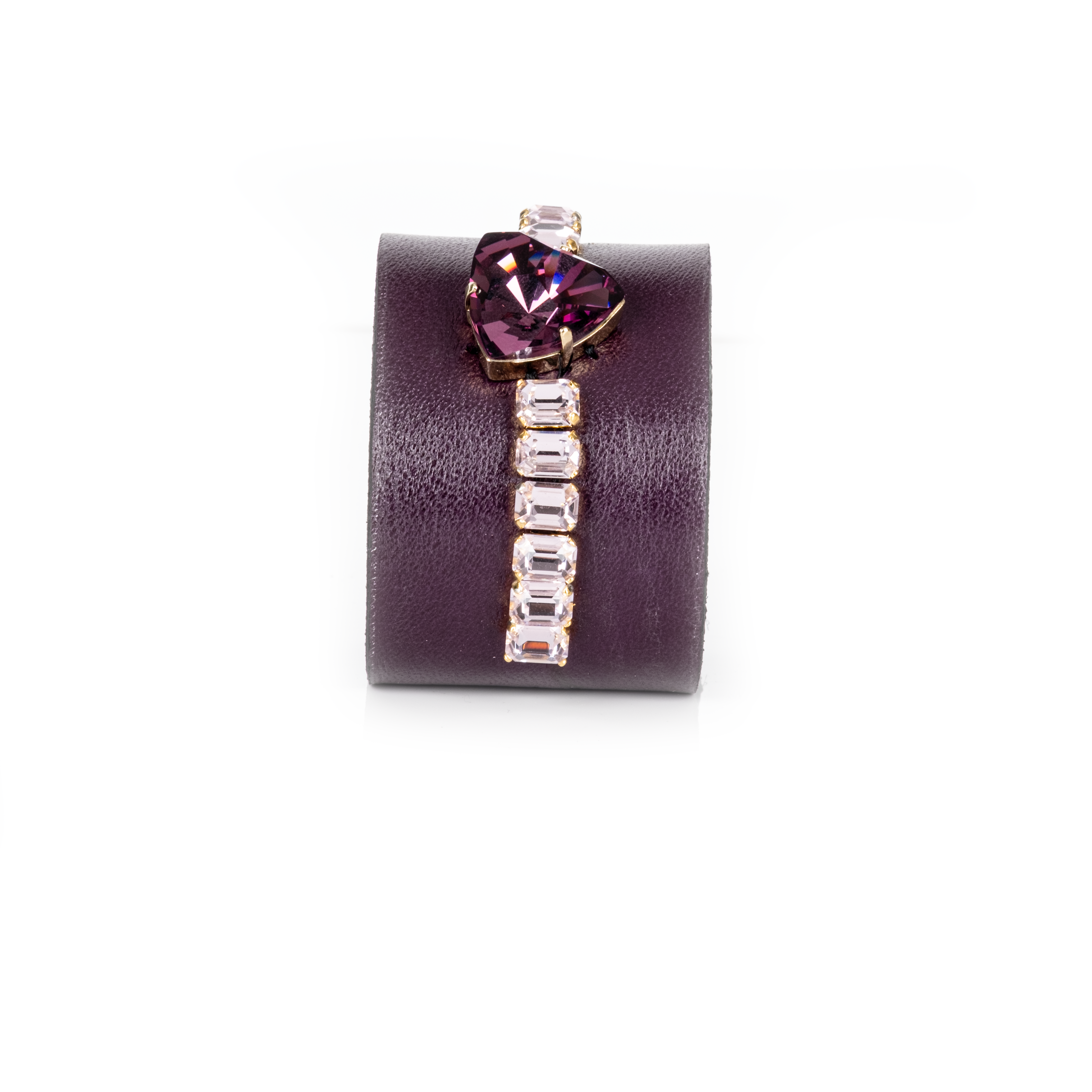 Burgundy leather cuff bracelet with large purple crystal and clear rectangular rhinestone row, wide statement bracelet on white background