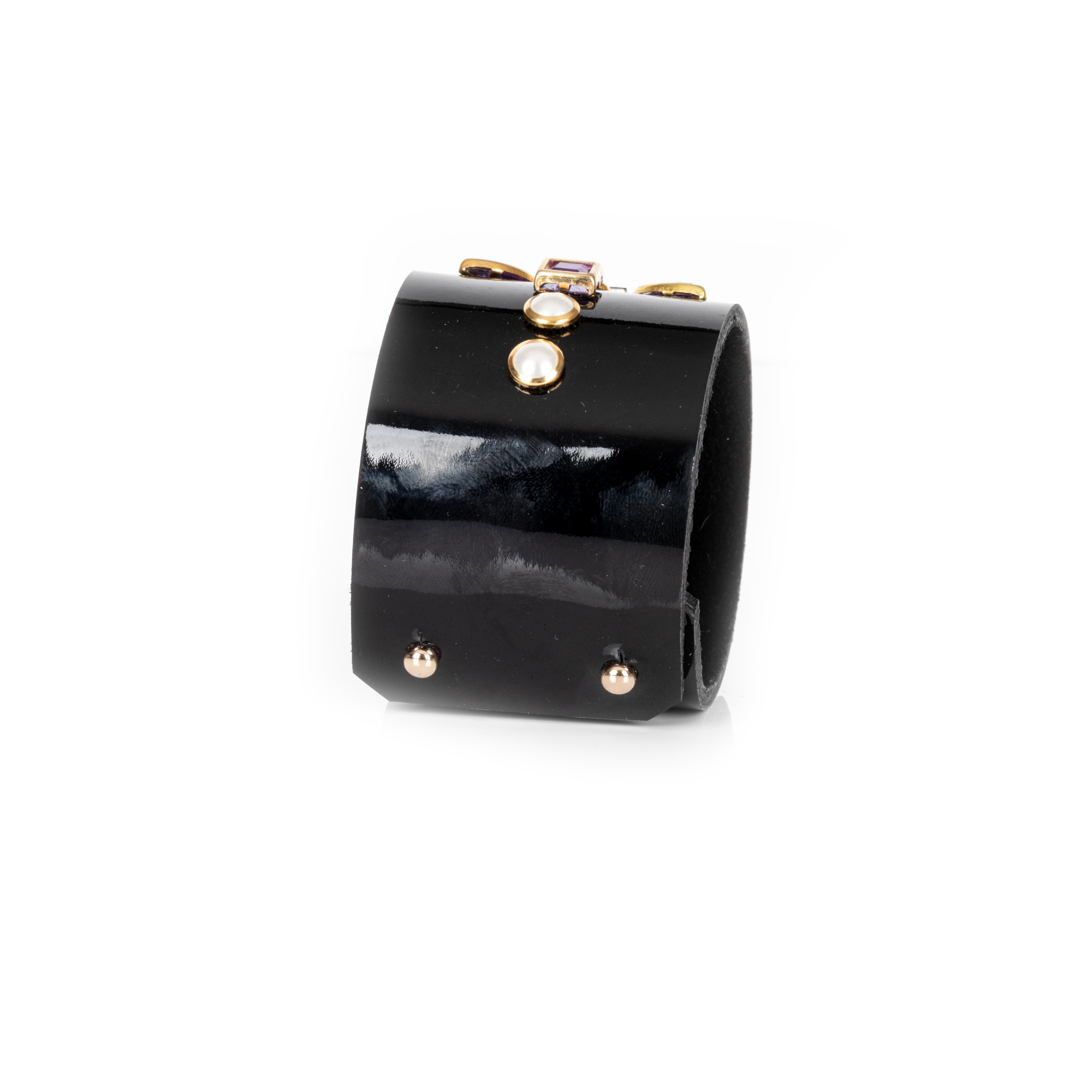 Black leather cuff bracelet with geometric multicolor crystals and gold settings, wide statement bracelet with purple and green gemstone accents for women