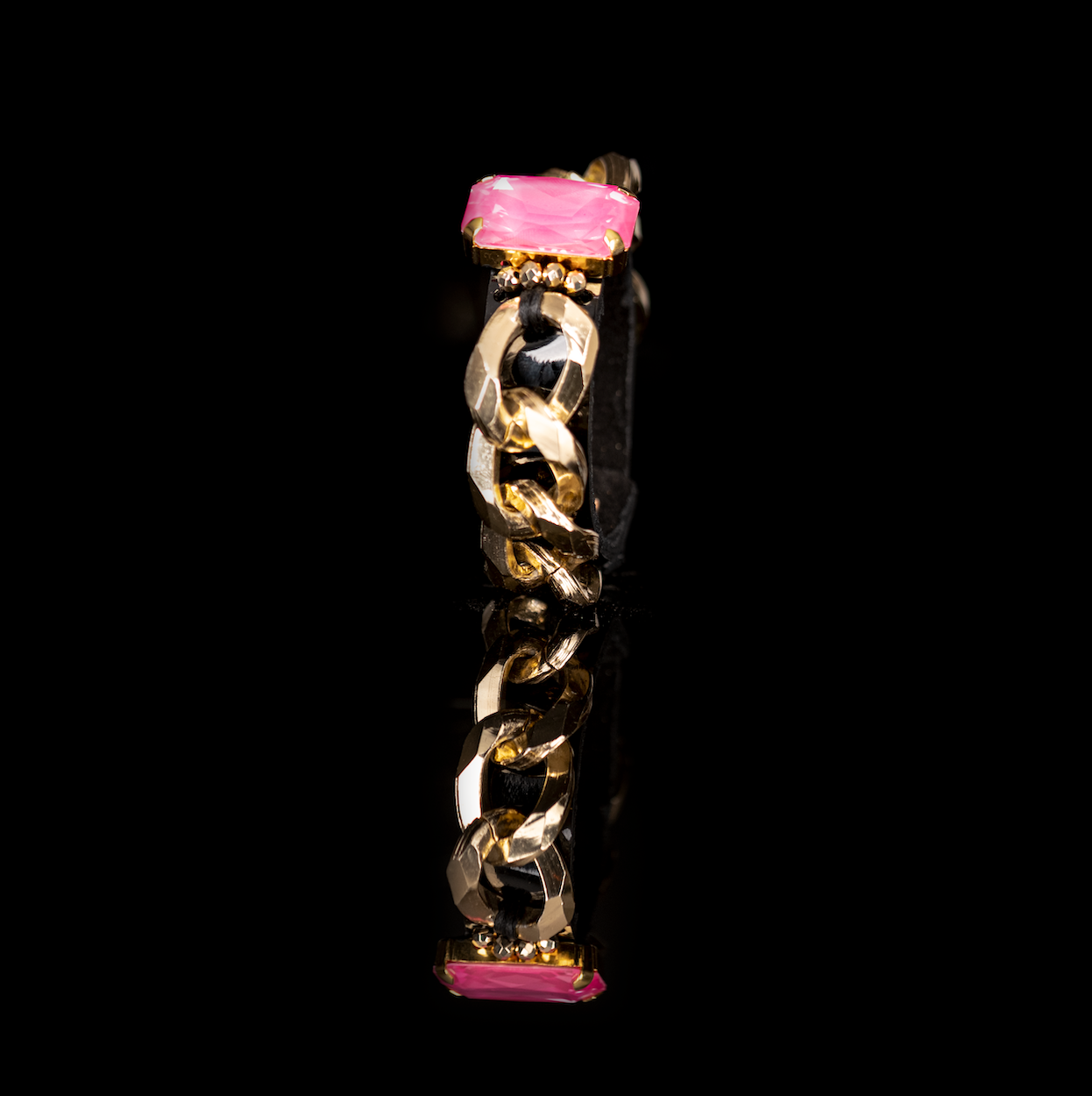 Black leather cuff bracelet with chunky gold chain and pink crystal, statement chain bracelet for women
