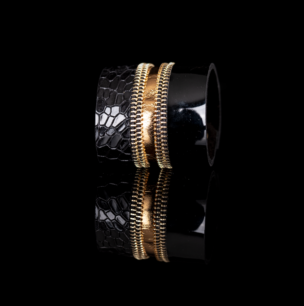 Black leather cuff bracelet with gold metallic center and zipper detail, textured reptile leather statement bracelet by THE DARK
